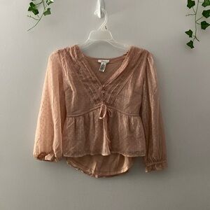 Woman’s pink blouse